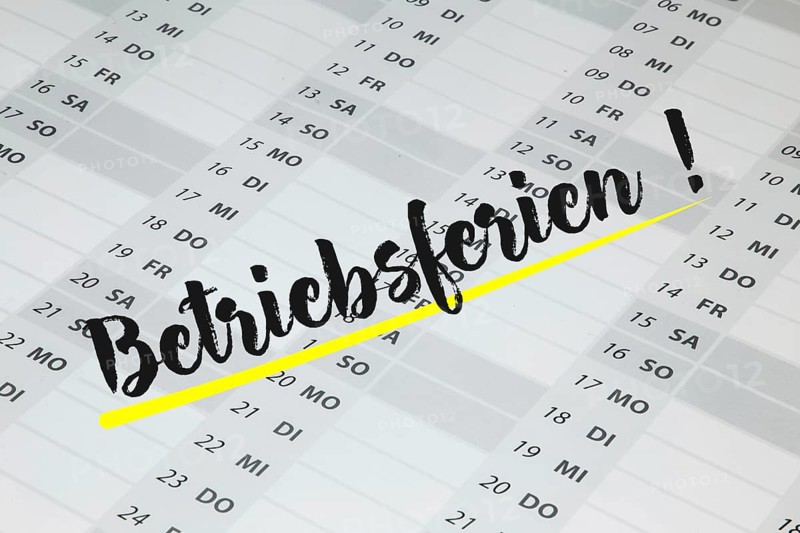 The word BETRIEBSFERIEN is written in large letters on a calendar (symbolic image)