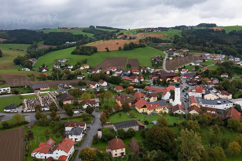 Drone shot, view of village with church, Enzenkirchen, Innviertel, Upper Austria, Austria, Europe