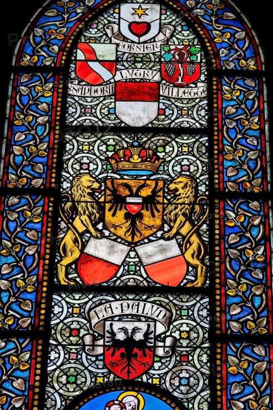 Colourful stained glass windows, Notre-Dame Cathedral, former episcopal church of the diocese of Lausanne, today the main reformed church of the city of Lausanne, canton of Vaud, Switzerland, Europe