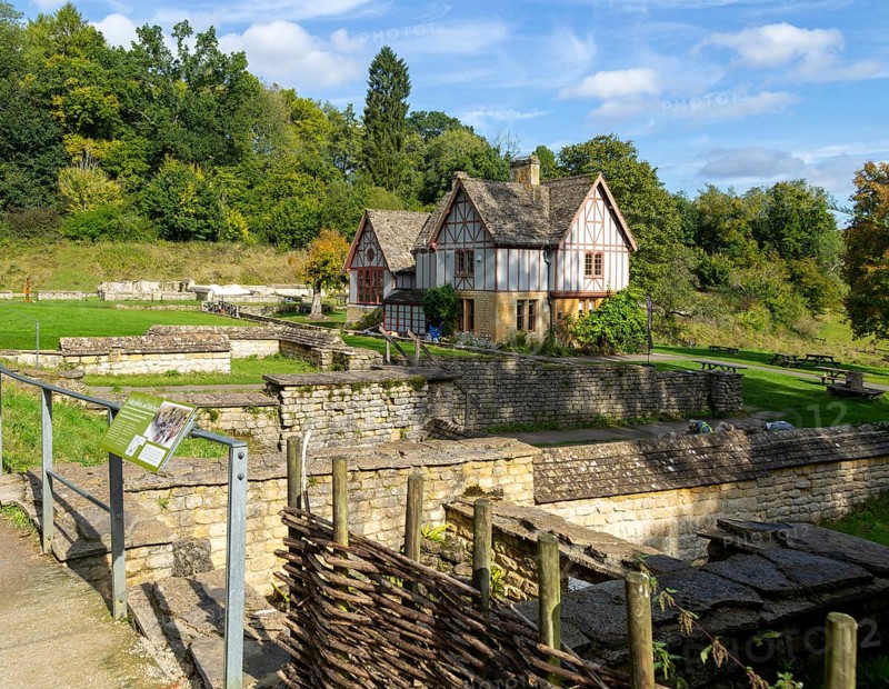 Overview of excavated walls and museum building, Chedworth Roman Villa, Chedworth, Cotswolds, Gloucestershire, England, UK