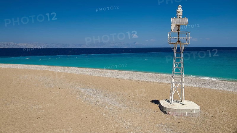 Northern tip of Rhodes, isolated lighthouse on sandy beach with wide sea view, harbour area, Rhodes town, Rhodes, Dodecanese, Greek Islands, Greece, Europe