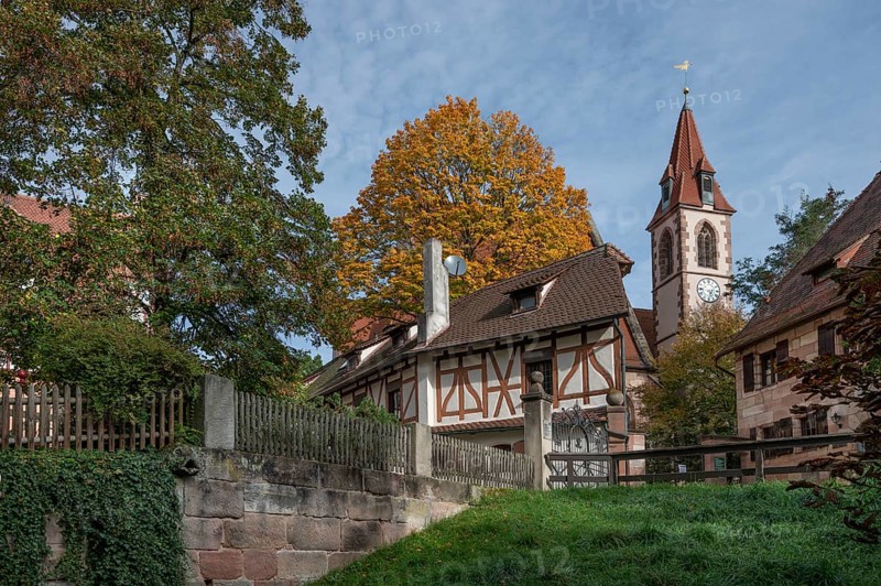 Detail of the Haller castle, already mentioned around 1200, behind the church of St Nicholas and St Peter, on the right the vicarage, Kirchenberg 11 and 13, Nuremberg-Mögeldorf, Middle Franconia, Bavaria, Germany, Europe