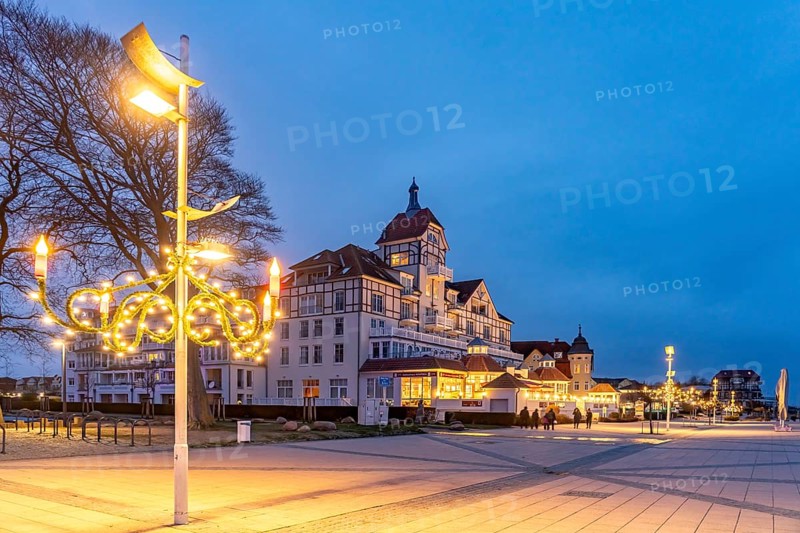 Baltic Sea promenade at Baltic Platz with Christmas lights in the Baltic seaside resort of Kühlungsborn at dusk, Mecklenburg-Vorpommern, Germany, Europe