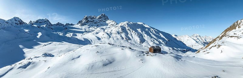 Alpine panorama, aerial view with Kesch hut, Alpine Club hut of the SAC in winter, Albula Alps, Grisons, Switzerland, Europe