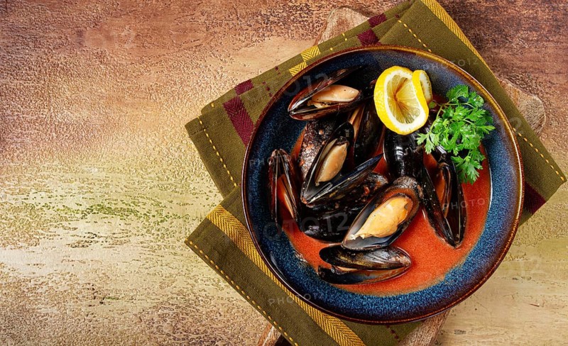 Fra Diavolo mussels, mussels in tomato sauce, Italian dish, on the table, top view, homemade, no people