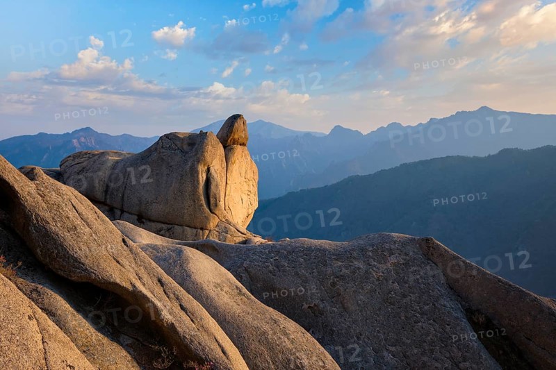 View of stones and rock formations from Ulsanbawi rock peak on sunset. Seoraksan National Park, South Corea