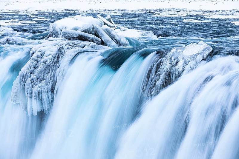 Godafoss waterfall, icy and snowy rock face, Northern Iceland Eyestra, Iceland, Europe