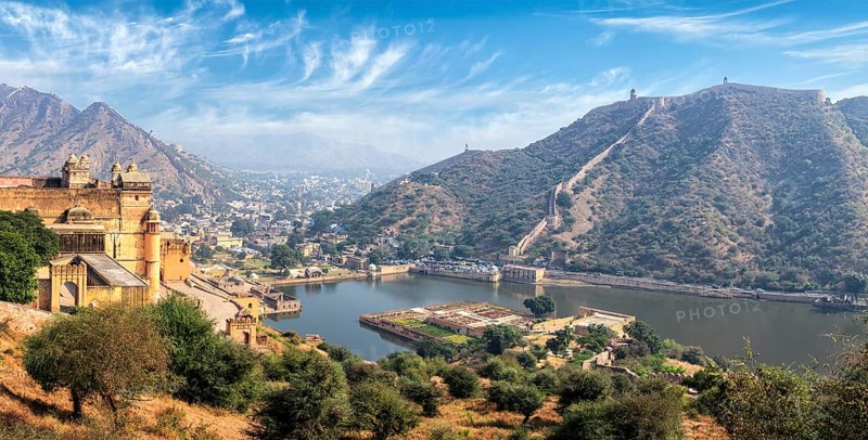 Indian travel famous tourist landmark, panorama view of Amer (Amber) fort and Maota lake, Rajasthan, India, Asia