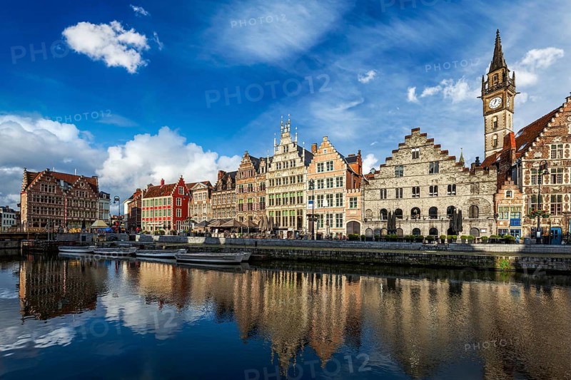 Europe Belgium medieval town travel background, Ghent canal and Graslei street on sunset. Ghent, Belgium, Europe