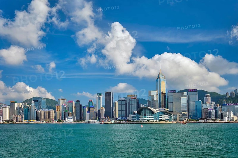 HONG KONG, CHINA, MAY 1, 2018: Hong Kong skyline cityscape downtown skyscrapers over Victoria Harbour on sunset. Hong Kong, China, Asia