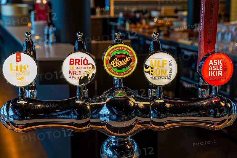 Illuminated beer tap at Hnoss Restaurant and Bar, Harpa Concert Hall and Congress Centre, Reykjavik, Reykjanes Peninsula, Sudurnes, Iceland, Europe