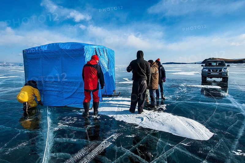 Group of scuba divers before a dive under ice, Lake Baikal, Olkhon Island, Pribaikalsky National Park, Irkutsk Province, Siberia, Russia, Europe