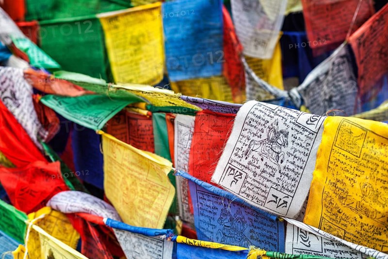 Tibetan Buddhism prayer flags (lungta) with Om Mani Padme Hum Buddhist mantra prayer. Leh, Ladakh, Jammu and Kashmir, India, Asia