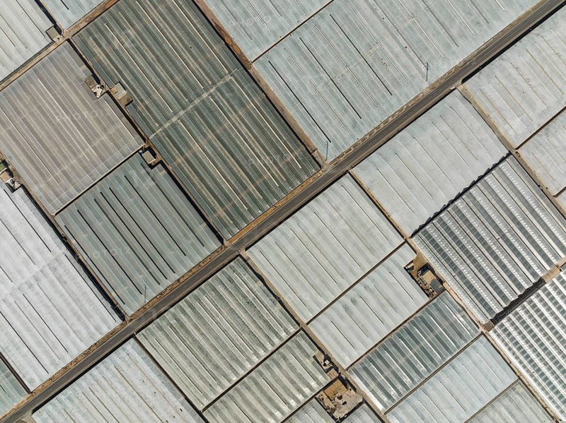 Masses of shimmering plastic greenhouses near El Ejido, aerial view, drone shot, Almería province, Andalusia, Spain, Europe