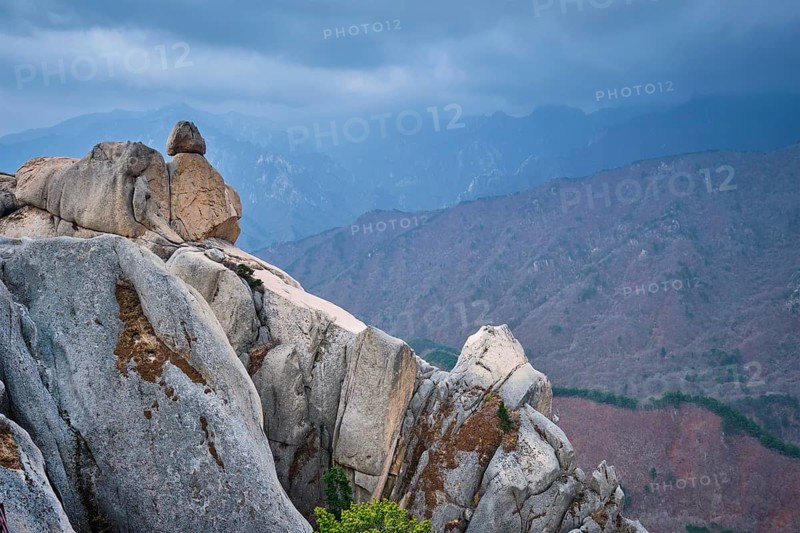 View of stone and rock formations from Ulsanbawi rock peak in stormy weather. Seoraksan National Park, South Corea