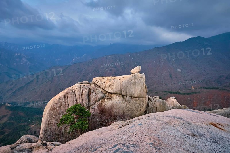 View of stone and rock formations from Ulsanbawi rock peak in stormy weather. Seoraksan National Park, South Corea