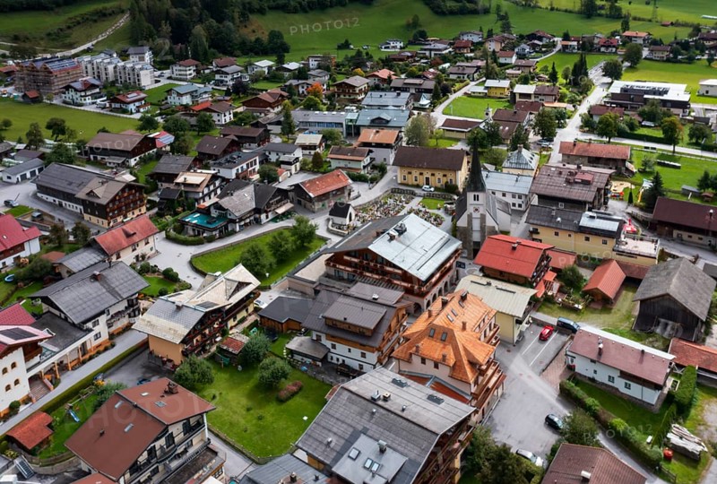 Drone image, residential buildings, view of village with parish church, Dorfgastein, Gasteinertal, Pongau, Salzburg province, Austria, Europe