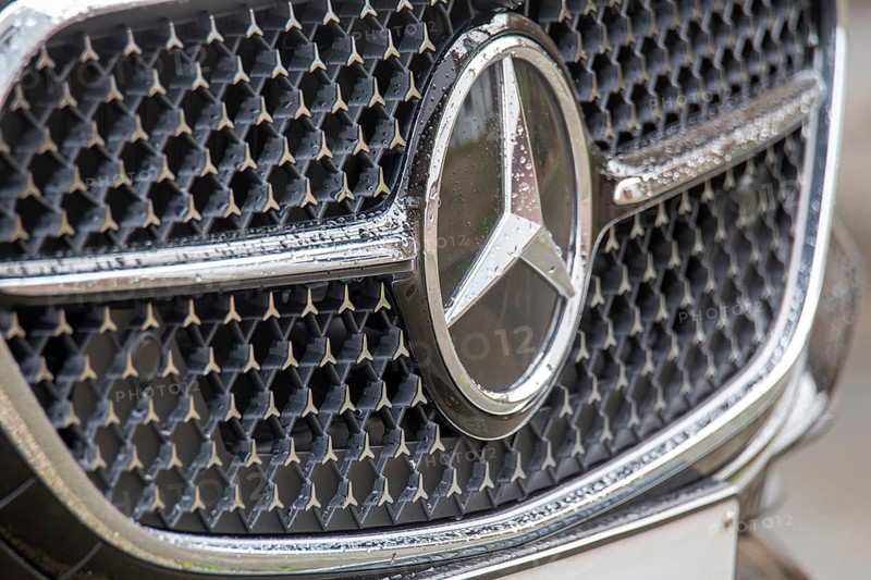 Close-up of the Mercedes star on the radiator grille