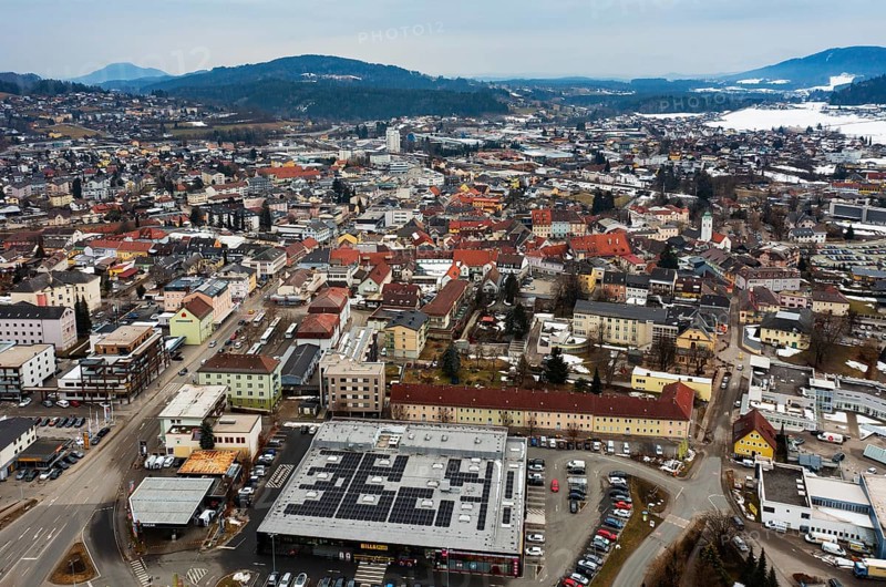 Drone shot, townscape with residential buildings and shopping centres, town view, Feldkirchen in Kärnten, Carinthia, Klagenfurt basin, Austria, Europe