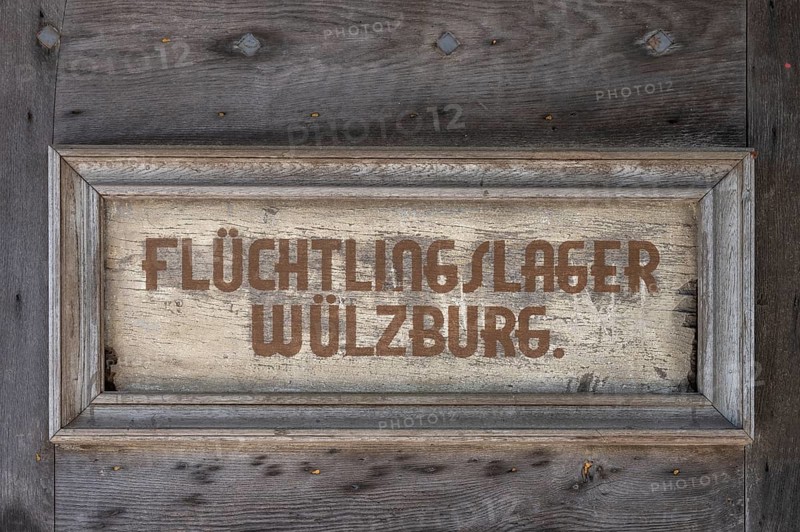 Sign at the entrance gate of Wülzburg Castle, reminder of the refugee camp from 1952 to 1968, Wülzburg Castle, Weissenburg, Middle Franconia, Bavaria, Germany, Europe