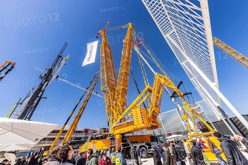 BAUMA Munich, 34th World's Leading Trade Fair for Construction Machinery, Building Material Machines, Mining Machines, Construction Vehicles and Construction Equipment. BAUMA is the world's largest trade fair in terms of exhibition space. LG 1800-1.0 lattice boom crane from the German manufacturer Liebherr with a maximum lifting height of 204 metres. Munich, Bavaria, Germany, Europe