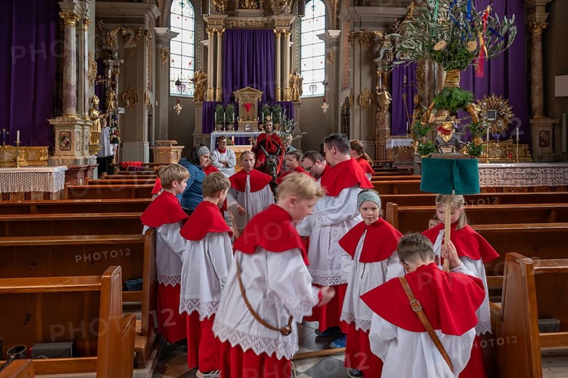 Altar servers preparing for the palm tree procession, tradition since the 18th century, Parish Church of the Assumption of the Virgin Mary, Thaur, Innsbruck district, Tyrol, Austria, Europe