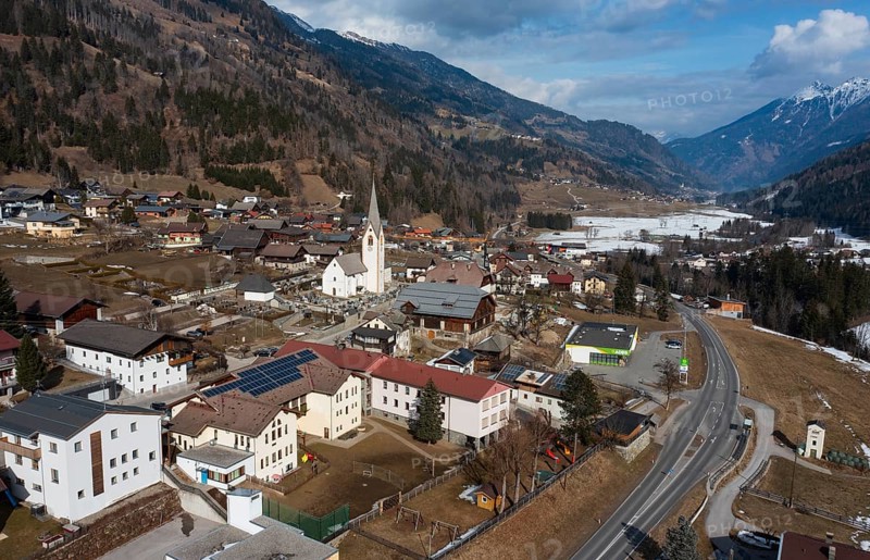 Drone shot, view of village with parish church, Rangersdorf, Mölltal, Carinthia, Austria, Europe