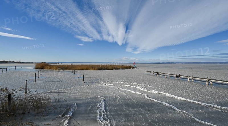 Frozen lake with ice in winter, Lake Neusiedl, Podersdorf am See, Burgenland, Austria, Europe