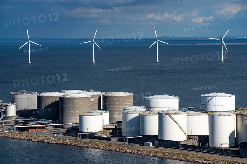 Wind turbines, offshore wind farm east of Copenhagen, in Øresund, tank farm in Prøvestenen harbour, Denmark, Europe