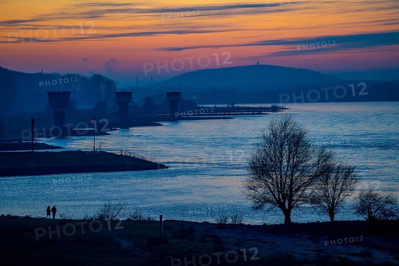 Rhine at Duisburg-Bruckhausen, towers of the water extraction facilities of ThyssenKrupp Steel steelworks, Winter, Duisburg, North Rhine-Westphalia, Germany, Europe