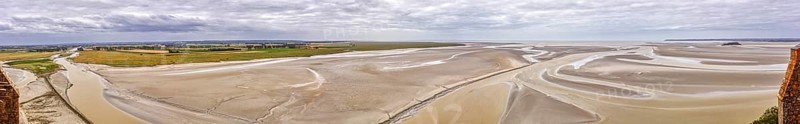 Expansive panorama with sand, watercourses and a wide horizon under a cloudy sky, Le Mont-Saint-Michel