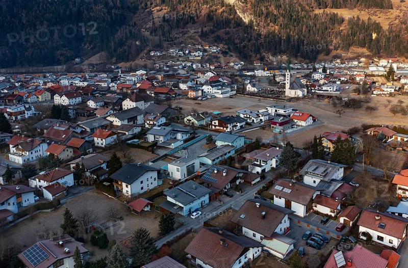 Drone shot, view of village with parish church, Prutz, Kaunertal, Inntal, Tyrol, Austria, Europe