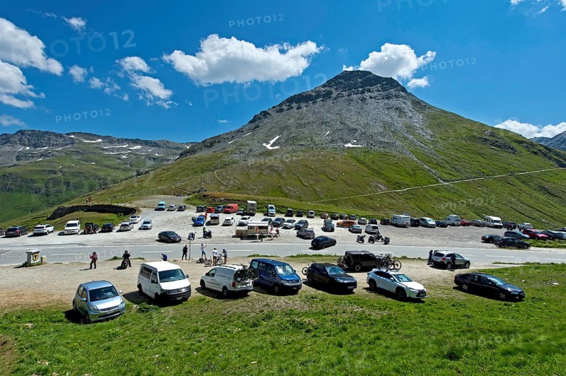 Car park with cars at the top of the Furka Pass, Goms, Valais, Switzerland, Europe