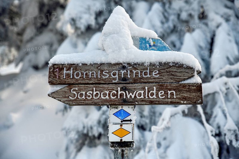 Snowy signpost near the Hornisgrinde, near Sasbach, Ortenaukreis, Black Forest, Baden-Württemberg, Germany, Europe