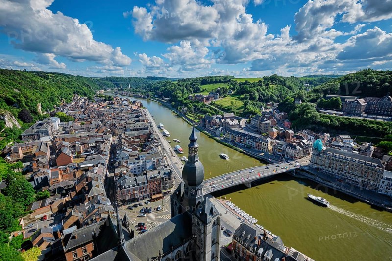 Aerial view of Dinant town, Collegiate Church of Notre Dame de Dinant, River Meuse and Pont Charles de Gaulle bridge from Dinant Citadel. Dinant, Belgium, Europe