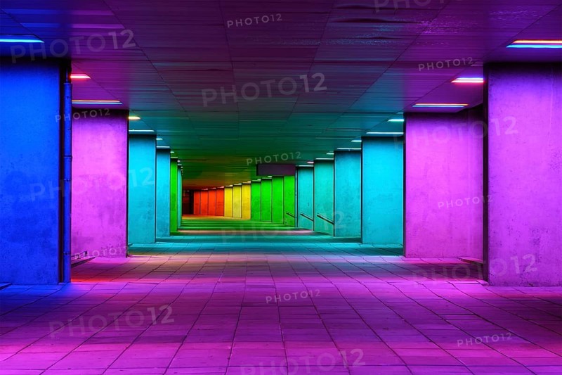 ROTTERDAM, NETHERLANDS, MAY 11, 2017: Colorful mulitcolored illuminated gallery tunnel rainbow passage installation under NAI building, Nederlands Architecture Institute near MuseumPark, Rotterdam