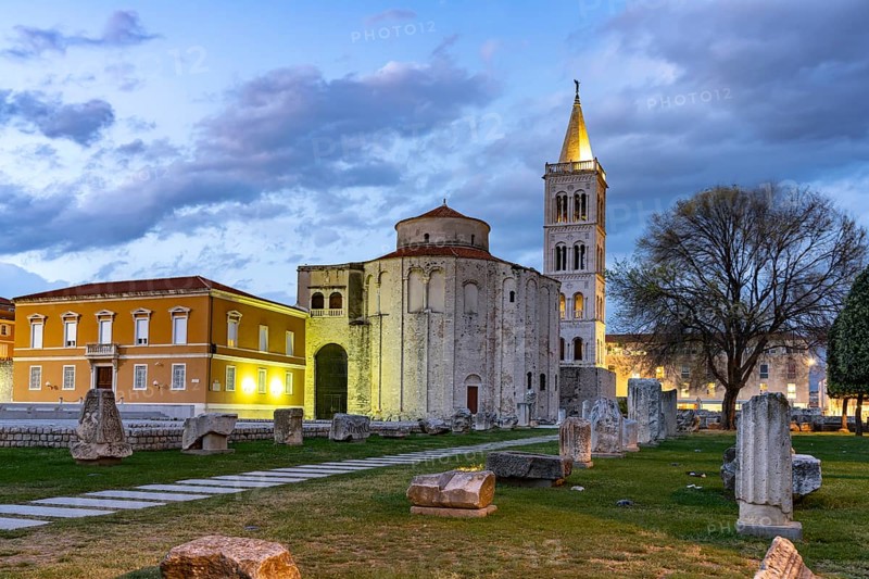 The Church of St Donatus, remains of the Roman forum and the bell tower of Zadar Cathedral at dusk, Croatia, Europe