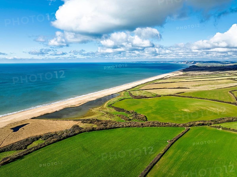 Farms over Swyre and West Bexington from a drone, West Bexington Nature Reserve, S W Coast Path, Dorchester, Dorset, England, United Kingdom, Europe