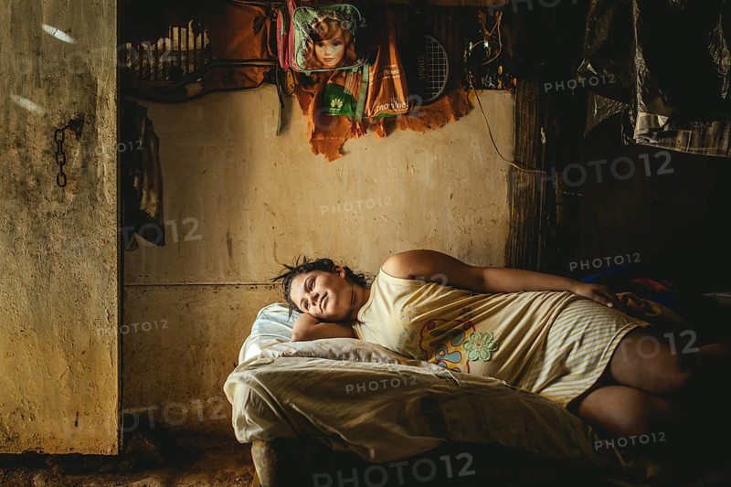 Rosalba, 18 years old, was recruited into prostitution at 14, last year she became pregnant, she is 8 months pregnant. She is currently living back in her family's hut in Túrgua, Venezuela, South America