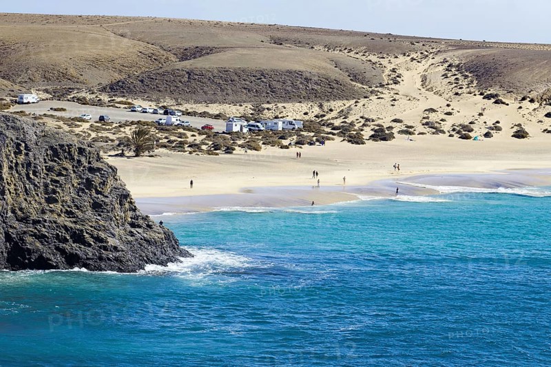 Papagayo beach with blue sea and dunes in a secluded coastal landscape, Playa Blanca, Lanzarote, Canary Islands, Spain, Europe