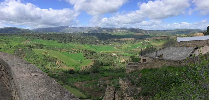 View to the west from the Puente Nuevo, New Bridge, Ronda, Malaga, Spain, Europe