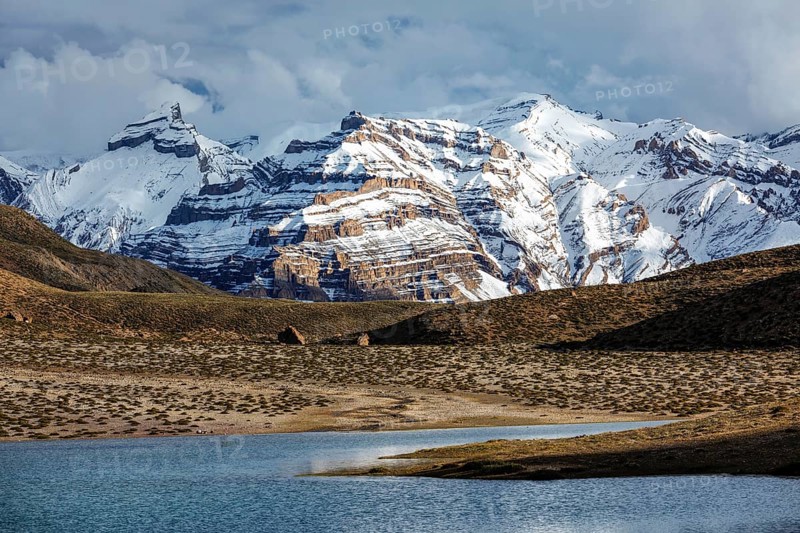 Himalayas mountains and mountain lake Dhankar Lake. Spiti Valley, Himachal Pradesh, India, Asia