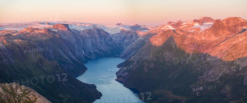 View from Seiskallåfjellet into the Nordfjorden, evening mood, Svartisen Glacier in the background, Saltfjellet Svartisen National Park, Helgeland Coast, Rødøy, Nordland, Norway, Europe
