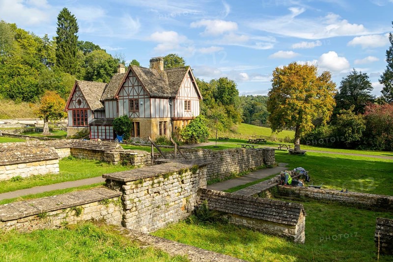 Overview of excavated walls and museum building, Chedworth Roman Villa, Chedworth, Cotswolds, Gloucestershire, England, UK