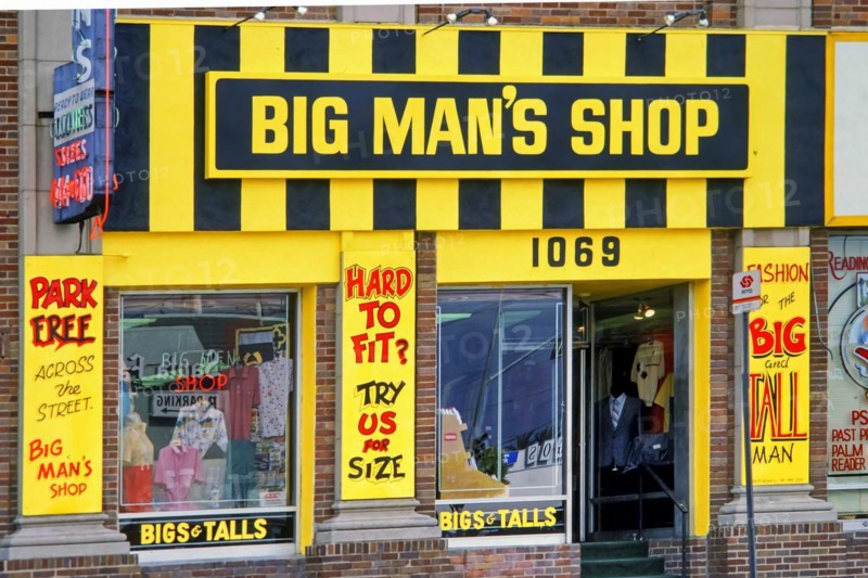 Facade of a plus size shop with eye-catching yellow and black neon sign, Big Man's Shop, retail, specialty clothing shop, men, overweight, obesity, Los Angeles, USA, North America