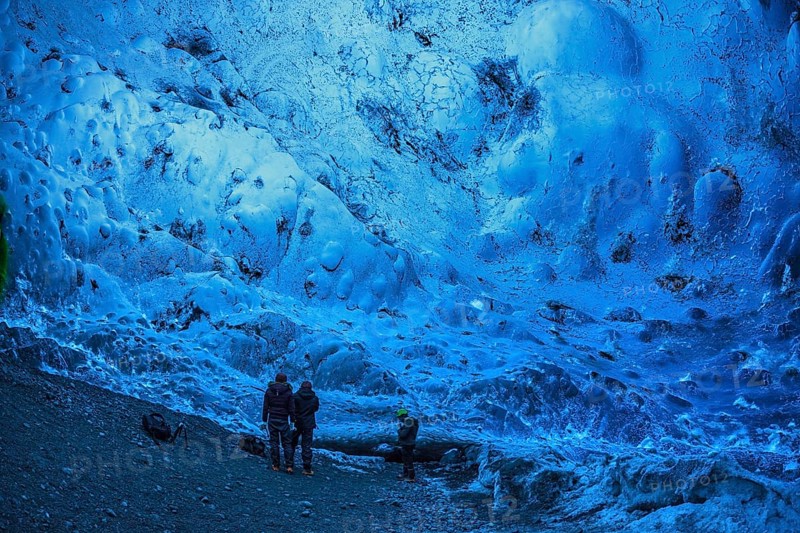 Tourists inside an ice cave, glacier cave, Vatnajökull, Iceland, Europe