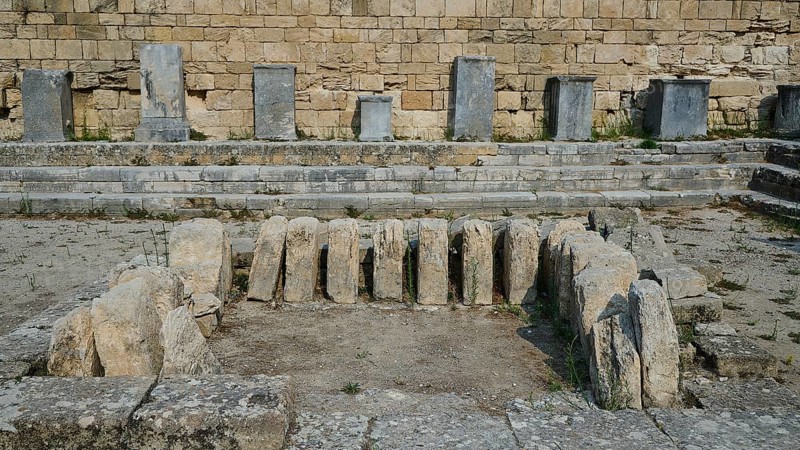 Several upright stones in an ancient archaeological excavation, ancient well house, Kamiros, Archaeological site, Ancient city, Foundation of Doric Greeks, Rhodes, Dodecanese, Greek Islands, Greece, Europe