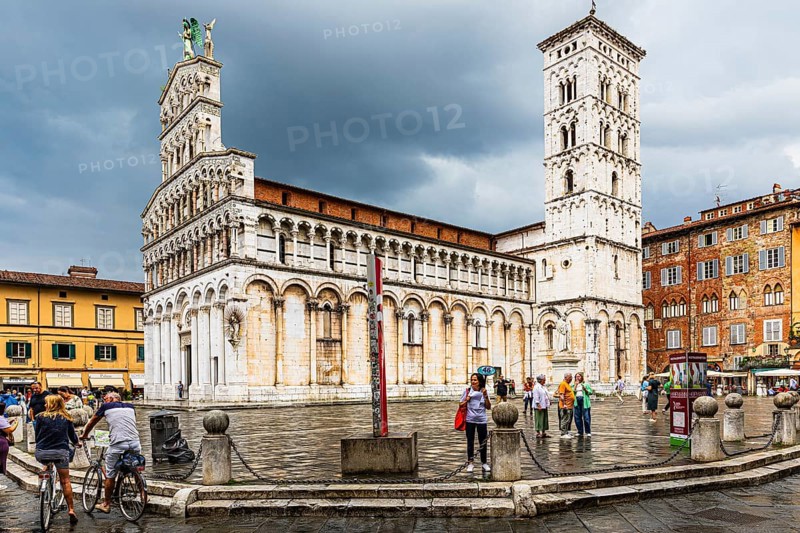 Rain clouds over the church and Piazza San Michele, historic city centre, Lucca, Tuscany, Italy, Europe