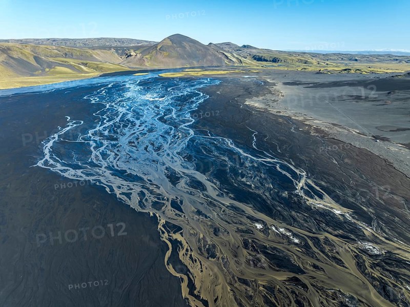 Aerial view, glaicial streams flow across Mælifellssandur, black sand desert, Icelandic highlands, Iceland, Europe