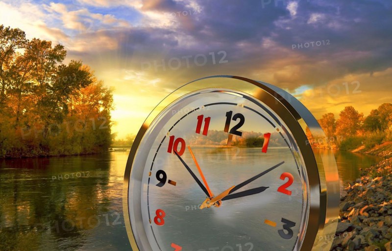 Symbol photo, clock, time, clock face, time, season, sunset, lake, landscape, sensation, sense of time, duration of time, time window